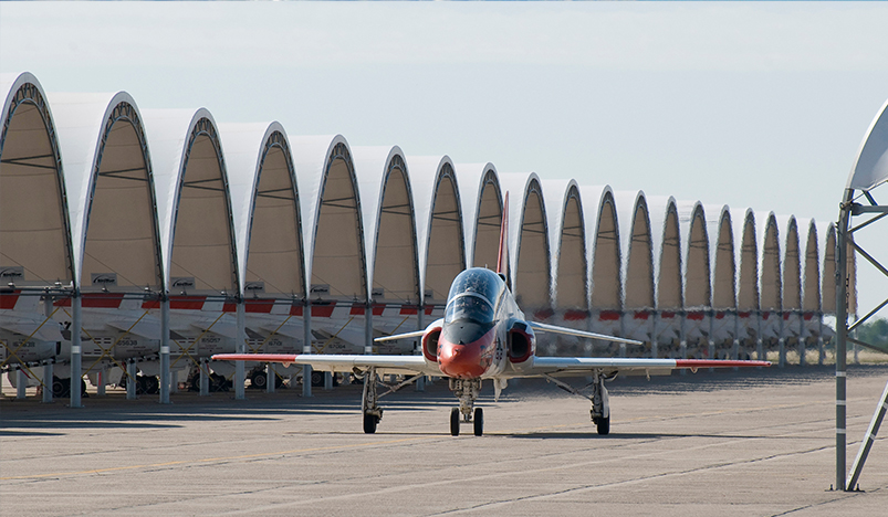 A T-45C Goshawk assigned to Training Air Wing One breaks away from a formation to reveal an underlying message. 